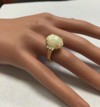 Load image into Gallery viewer, 6.30 Carats Natural Impressive Ethiopian Opal and Diamond 14K Solid Yellow Gold Ring