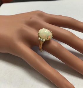6.30 Carats Natural Impressive Ethiopian Opal and Diamond 14K Solid Yellow Gold Ring