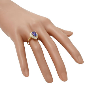 2.55 Carats Natural Splendid Tanzanite and Diamond 14K Solid Yellow Gold Ring