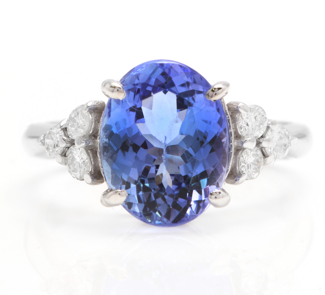 3.85 Carats Natural Very Nice Looking Tanzanite and Diamond 14K Solid White Gold Ring