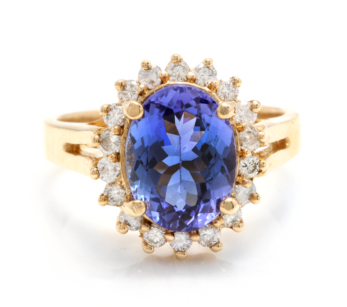4.10 Carats Natural Tanzanite and Diamond 14k Solid Yellow Gold Ring
