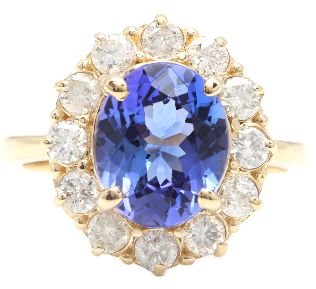 4.15 Carats Natural Very Nice Looking Tanzanite and Diamond 14K Solid Yellow Gold Ring
