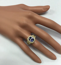 Load image into Gallery viewer, 3.30 Carat Natural Tanzanite and Diamond 18 Karat Solid Gold Ring