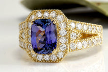 Load image into Gallery viewer, 3.30 Carat Natural Tanzanite and Diamond 18 Karat Solid Gold Ring