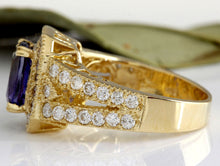 Load image into Gallery viewer, 3.30 Carat Natural Tanzanite and Diamond 18 Karat Solid Gold Ring