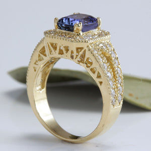 3.30 Carat Natural Tanzanite and Diamond 18 Karat Solid Gold Ring
