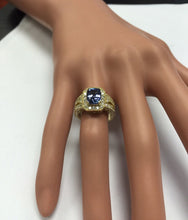 Load image into Gallery viewer, 3.30 Carat Natural Tanzanite and Diamond 18 Karat Solid Gold Ring