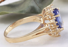 Load image into Gallery viewer, 5.50 Carats Natural Very Nice Looking Tanzanite and Diamond 14K Solid Yellow Gold Ring