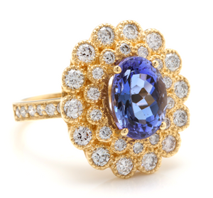 5.50 Carats Natural Very Nice Looking Tanzanite and Diamond 14K Solid Yellow Gold Ring
