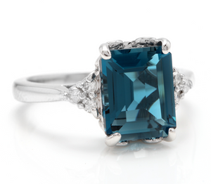 3.85 Carats Natural Impressive London Blue Topaz and Diamond 14K White Gold Ring