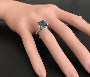 3.85 Carats Natural Impressive London Blue Topaz and Diamond 14K White Gold Ring